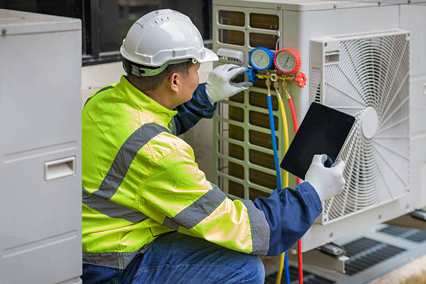 Professional Air Conditioning Repair technician working in Round Rock, TX